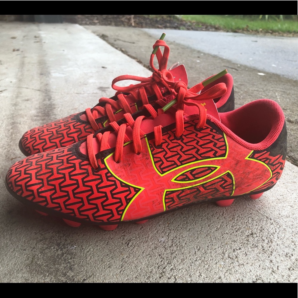 Orange kids soccer cleats under armor